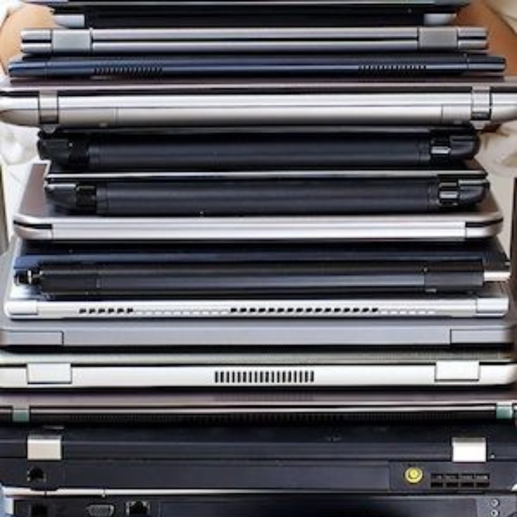 Multiple Laptops Displayed for Sale and Service