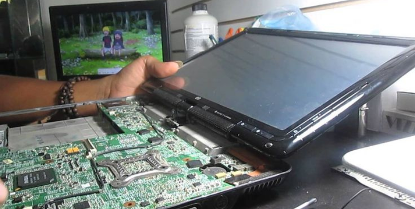 Open laptop showing internal hardware components and design